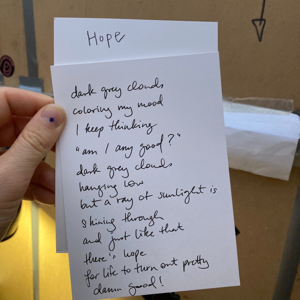 a poem about "hope", handwritten of one of the poets from the Poetomat